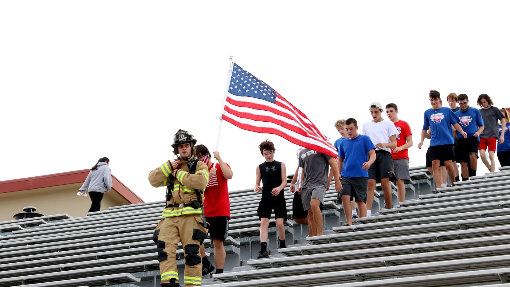 Grapevine High School wrestling team pays tribute to 9/11 first responders