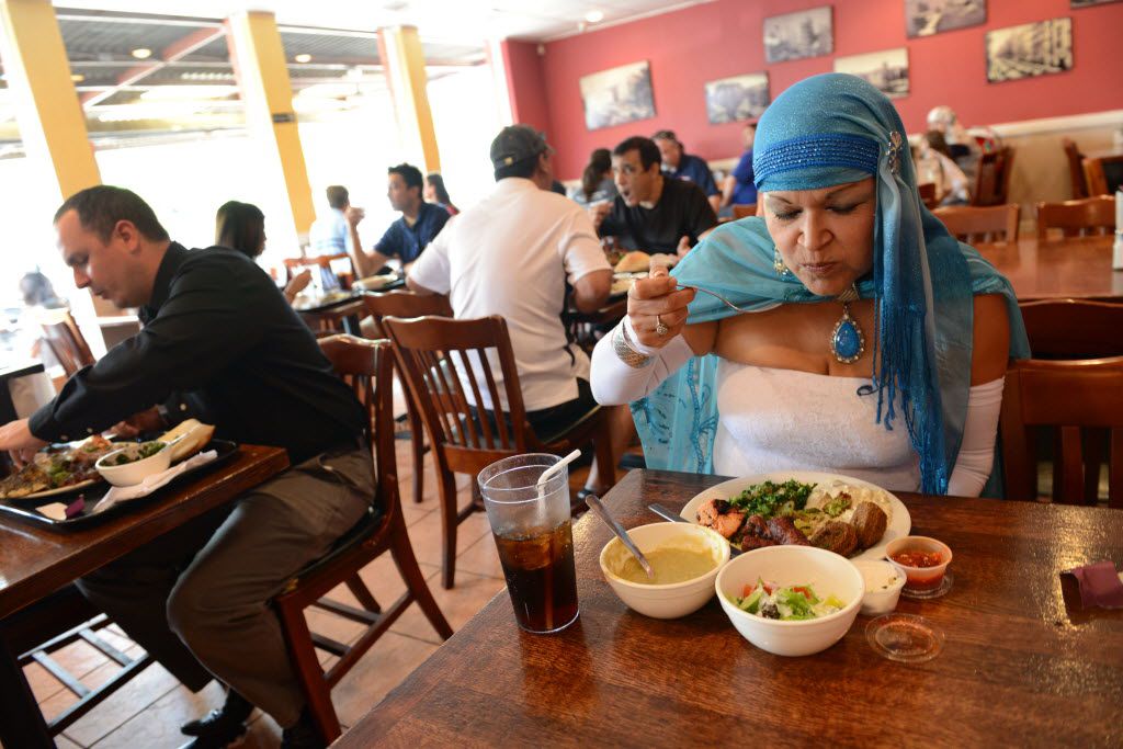 Elma Bat Judah Perez eats lunch at Afrah Mediterranean Restaurant and Pastries. The...