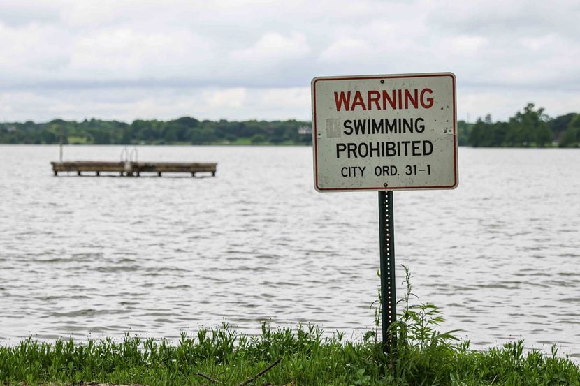 A sign near the Bath House Cultural Center on the east shore of White Rock Lake in Dallas...