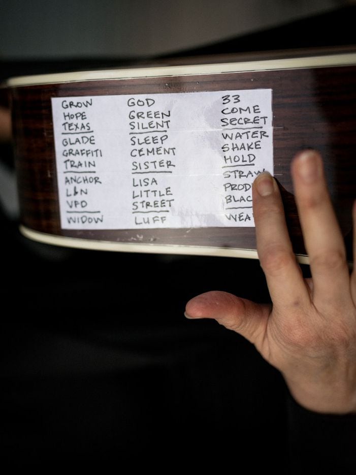 Michelle Shocked's Mercury Trilogy set list taped on her guitar. 