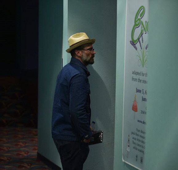 Actor writer, producer and director Jason Lee stands in the side aisle before sitting down...