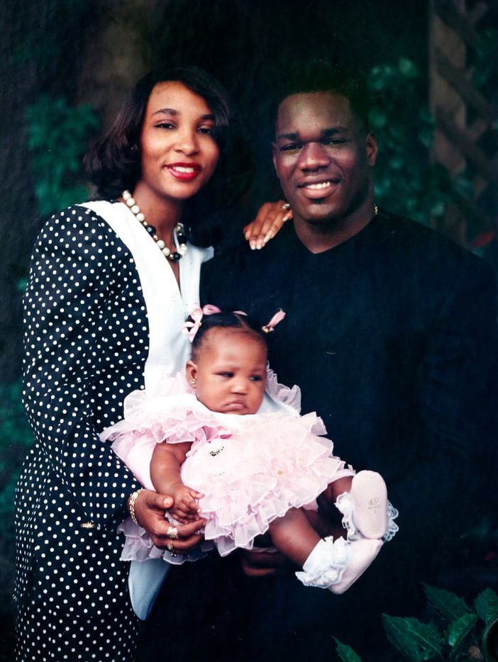 Former Cincinnati Bengal and Los Angeles 
Raider Rickey Dixon, right, is pictured with his wife Lorraine and their daughter Brittanney, who is now in her 20s. Dixon now has ALS and weighs 115 pounds. 