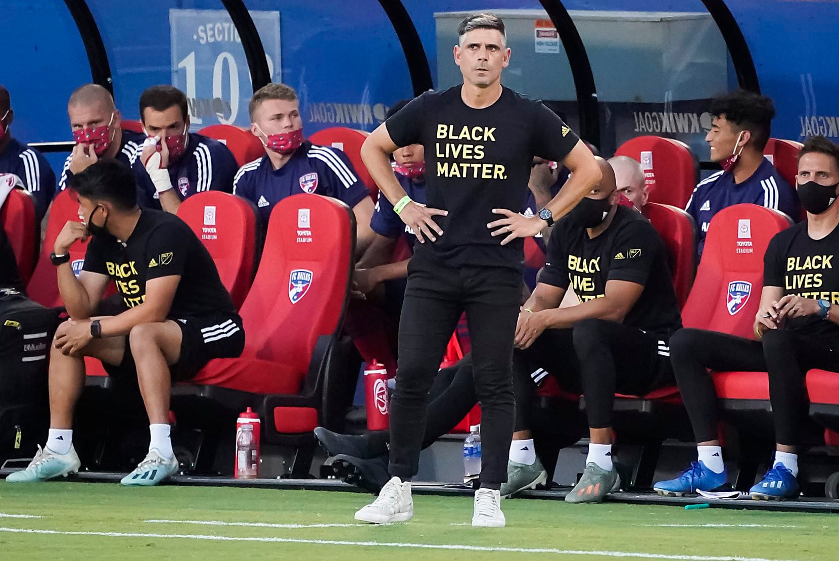 FC Dallas head coach Luchi Gonzalez wears a Black Live Matter t-shirt on the bench during the first half of an MLS soccer game against Nashville SC at Toyota Stadium on Wednesday, Aug. 12, 2020, in Frisco, Texas. (Smiley N. Pool/The Dallas Morning News)