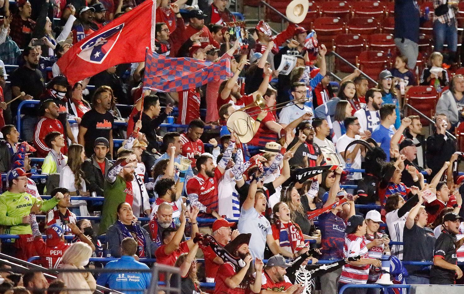 FC Dallas fans celebrate after bringing the score to a tie during the first half as FC Dallas hosted Austin FC at Toyota Stadium in Frisco on Saturday, October 30, 2021. (Stewart F. House/Special Contributor)