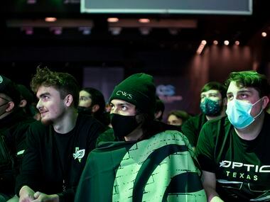 Emilio King, center, watches in anticipation as OpTic Texas competes against the Atlanta...