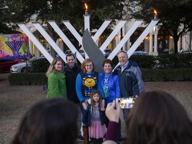 Families take a photo at the Chabad of Frisco’s 2019 menorah lighting. This year’s event is Dec. 5 in Frisco Square.