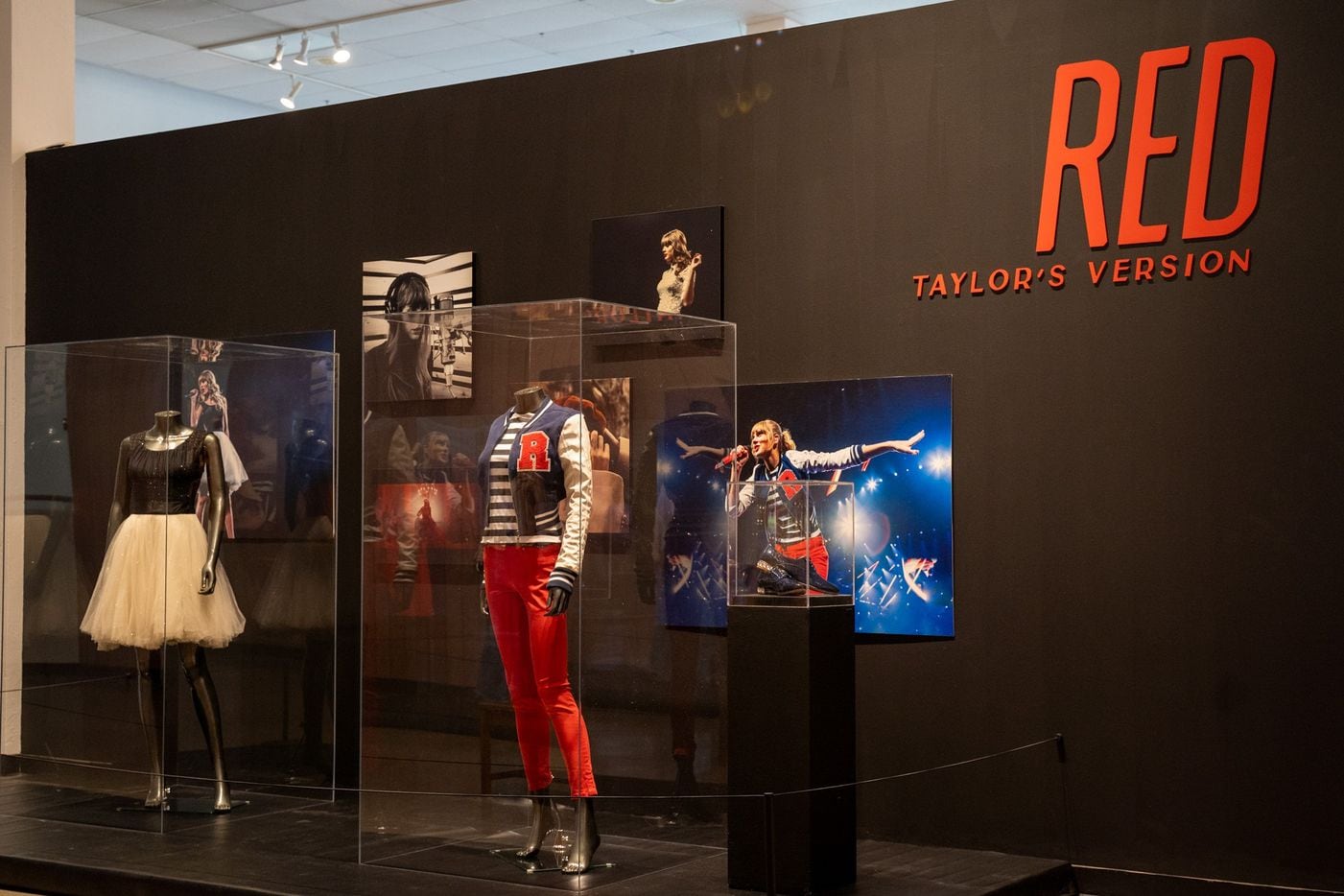 Outfits from Taylor Swift's "Red" tour are on display at the Arlington Museum of Art's...