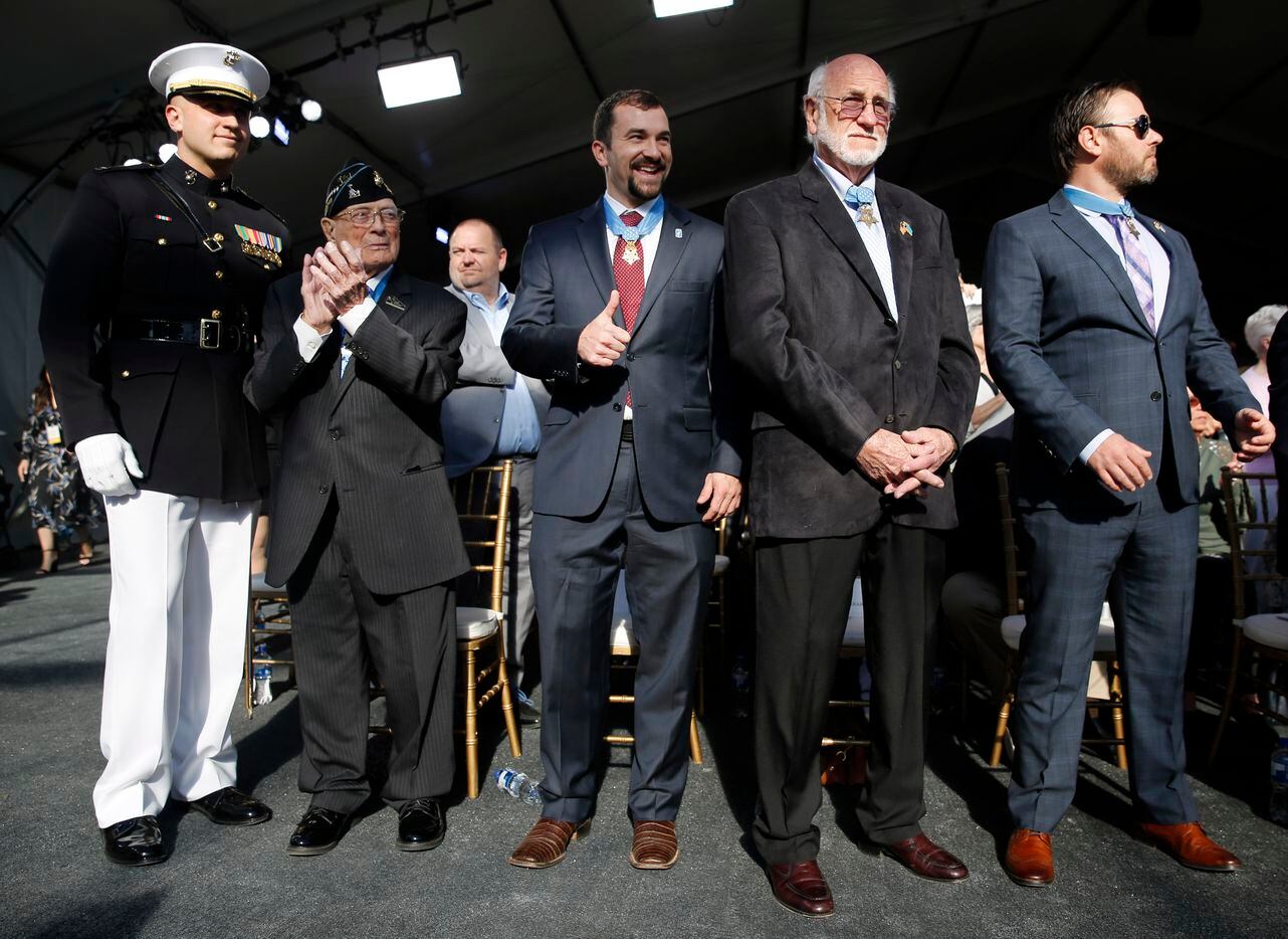 Medal of Honor recipients (from left): Escort and Marine Corps Capt. Nicholas Maguire, World...