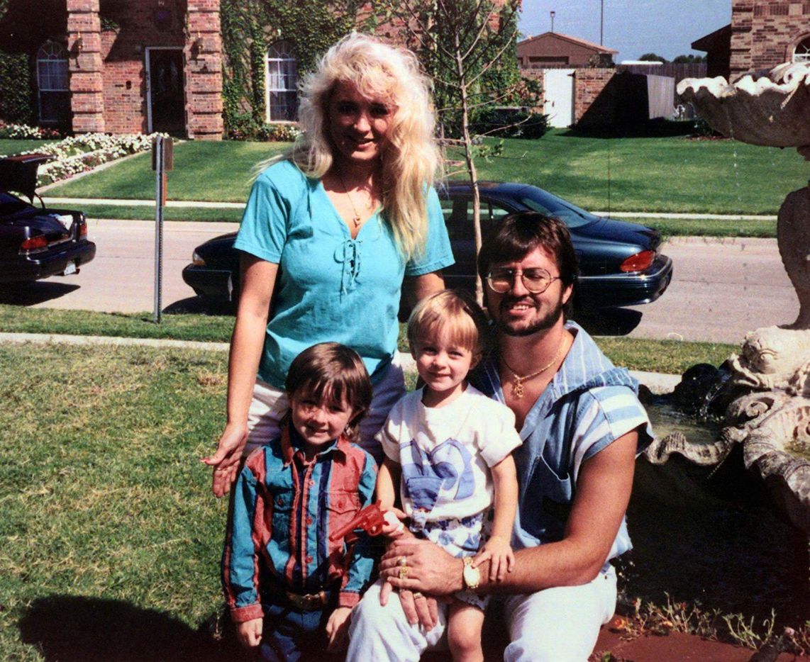 Darlie Routier poses with husband Darin and sons Damon (left) and Devon in a 1993 family...