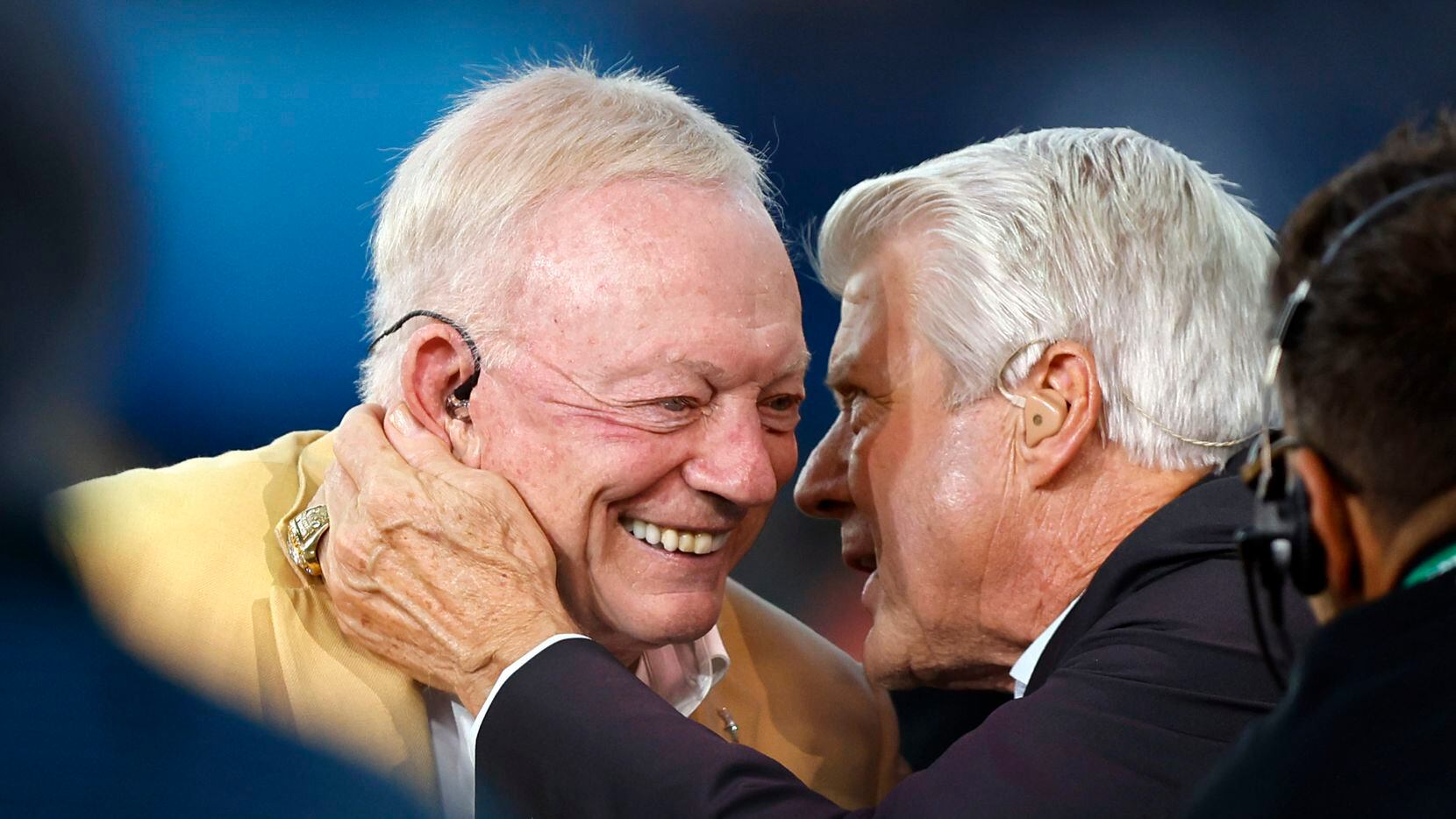 Dallas Cowboys owner Jerry Jones (left) and his former head coach Jimmy Johnson embrace on...