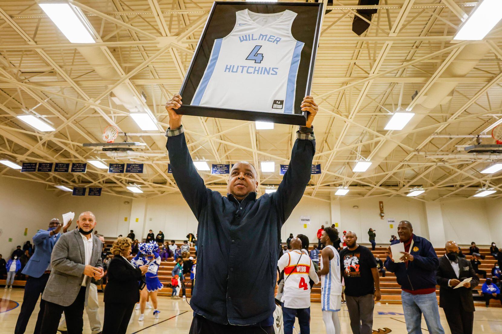 Former NBA basketball player Michael Anthony Jerome "Spud" Webb during halftime ceremony for...
