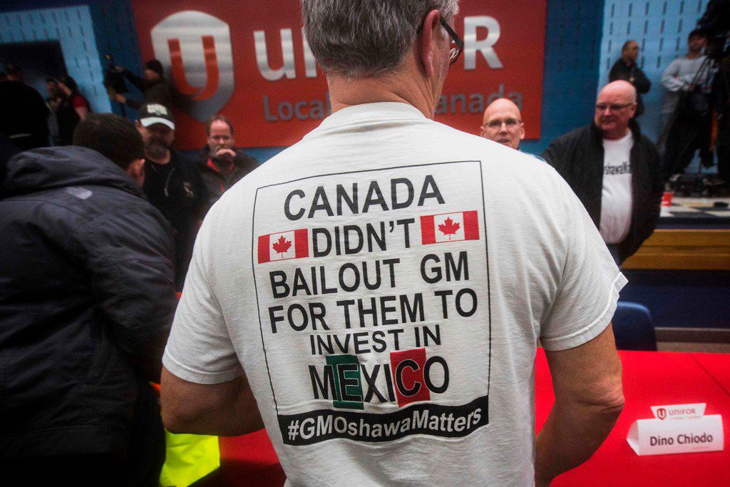 A worker wears a T-shirt during an information session at Local 222 in Oshawa, Ontario, on...