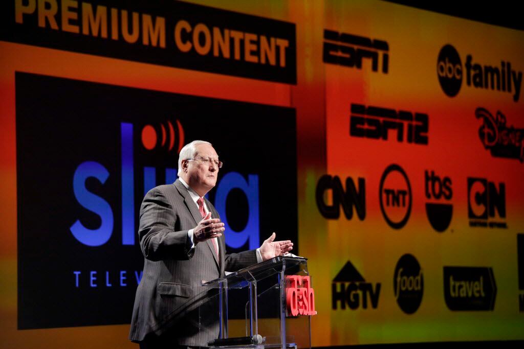 FILE- In this Jan. 5, 2015, file photo, Joe Clayton, president and CEO of Dish Network,...