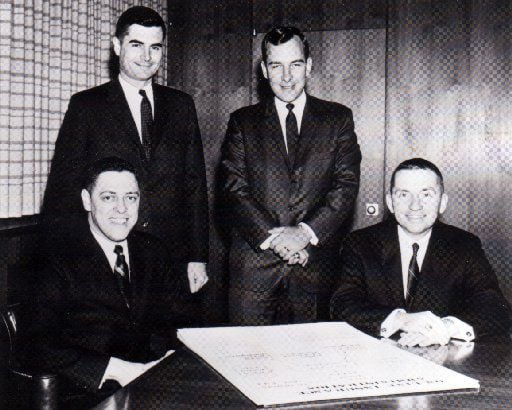 This 1960s photo shows the earliest members of the EDS team (from left): Tom Marquez, Tom...