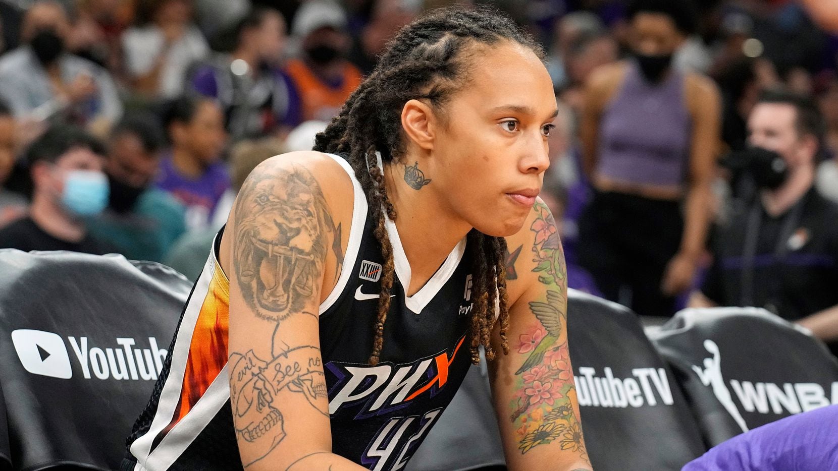 FILE - Phoenix Mercury center Brittney Griner sits during the first half of Game 2 of...