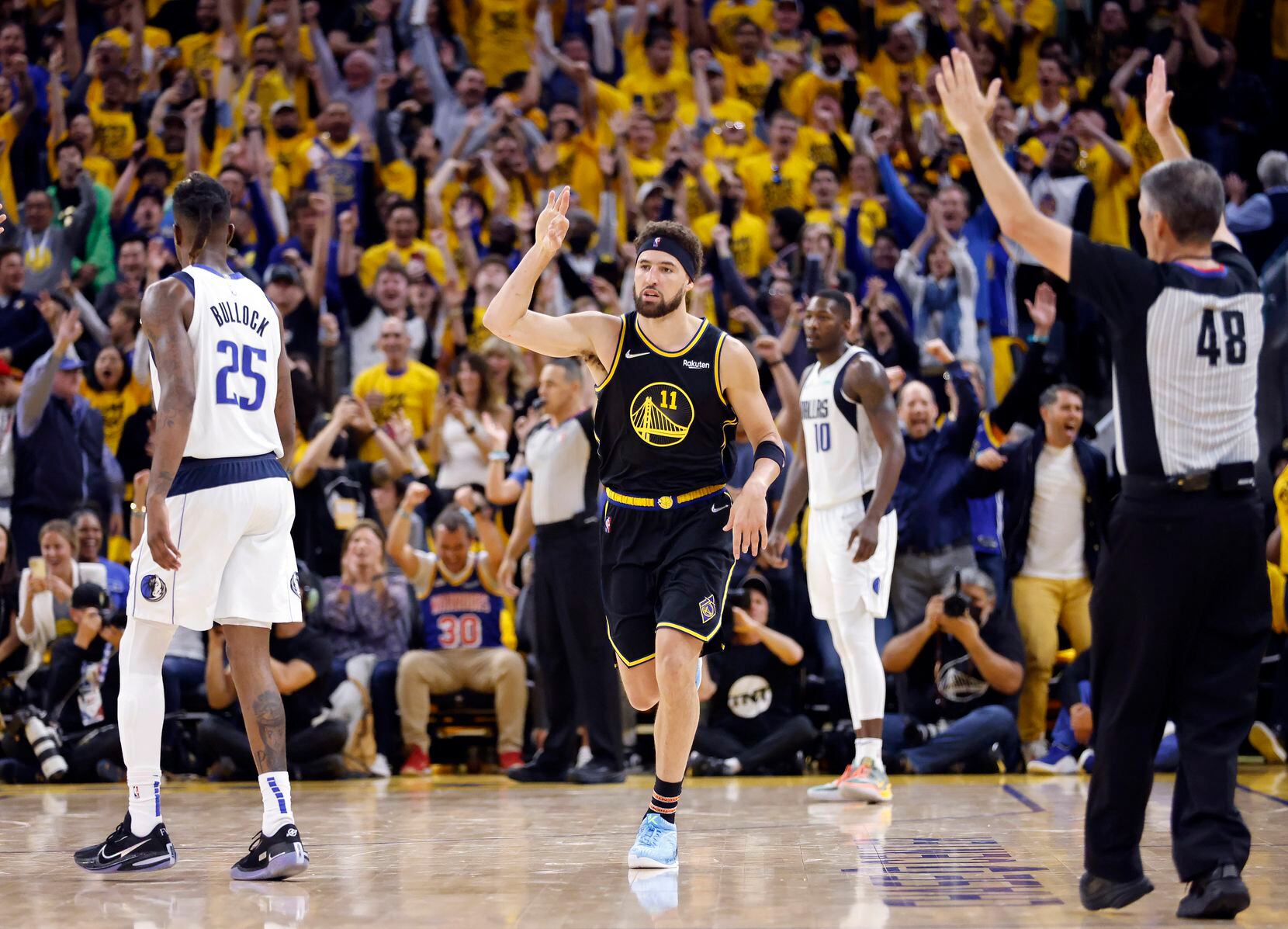 Golden State Warriors guard Klay Thompson (11) celebrates a big three-pointer during the...