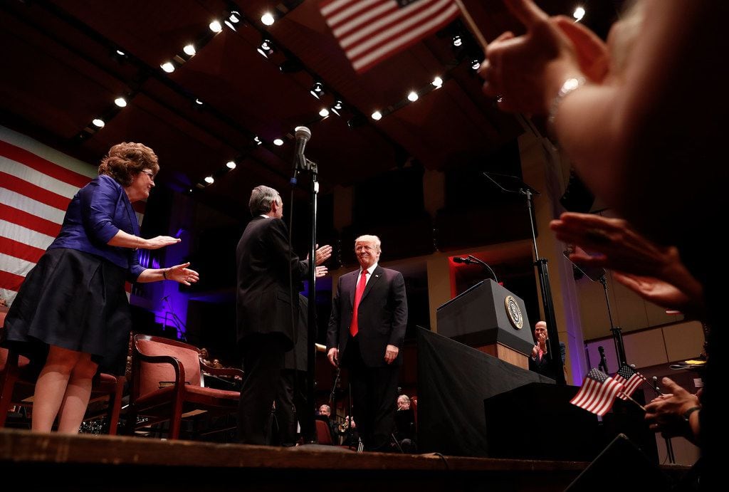 President Donald Trump was greeted by Pastor Robert Jeffress of First Baptist Dallas as he...