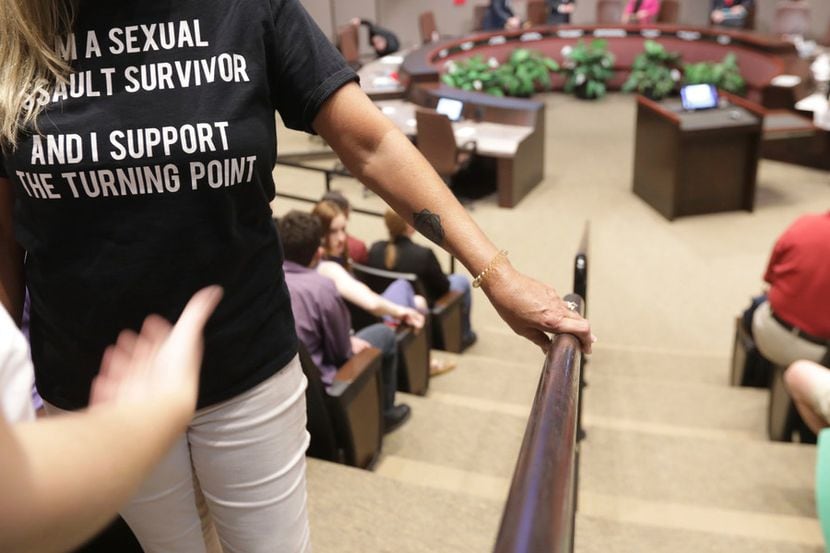 A supporter of The Turning Point waited Monday night for a chance to speak at a Plano City...