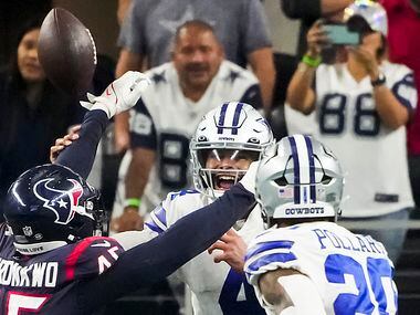 Dallas Cowboys quarterback Dak Prescott (4) has a pass knocked away by Houston Texans...