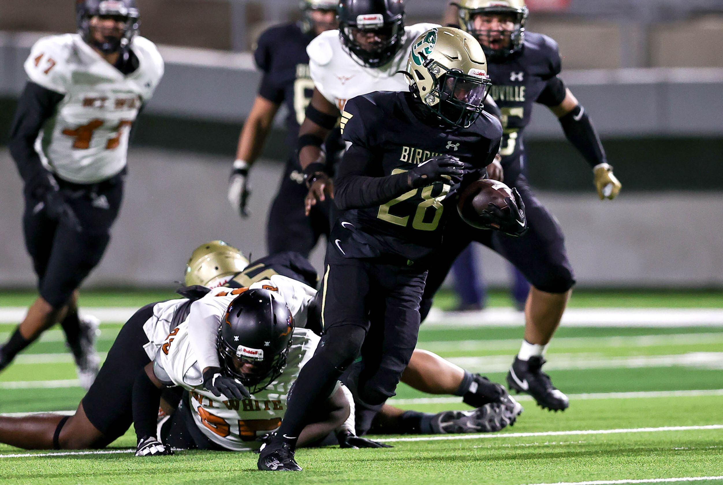 Birdville running back Jamal Ramsey finds a huge hole to run against W.T. White during the...