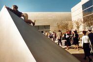 Misha Frey, 7, climbs on a sculpture during a Saturday preview of the new Dallas Museum of...