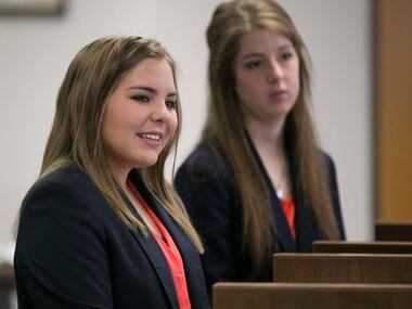 Kara Lehnert, 18, and  Annisa McCollum, 17, both from Sweetwater, speak in favor of keeping...