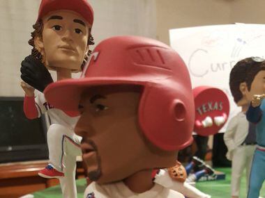 An Adrian Beltre bobblehead from the collection of Johnnie Lehew. The Fort Worth resident...