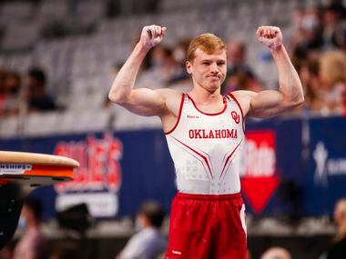 University of Oklahoma's Matt Wenske celebrates after completing the vault during Day 1 of...