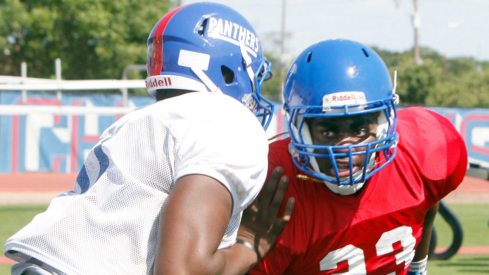 Duncanville Panthers defensive lineman Omari Abor (23) eyes the quarterback as he works around a block. The Duncanville Panthers varsity football team conducted drills during a practice session held at Panther Stadium on their school complex in Duncanville on August 11, 2021.