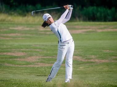 Professional golfer Jin Young Ko plays a ball off the No. 12 fairway during the final round...