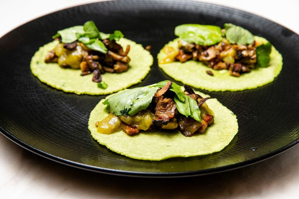 A dish called mixed three mushroom and wild tomatillo. A standard order will get you two...
