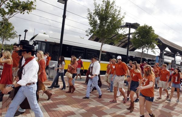 Texas and OU fans get off the Green Line at the MLK Jr. DART Station on Oct. 8, 2011.