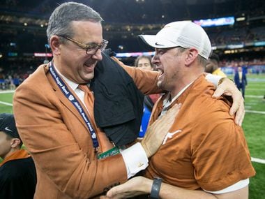 Texas athletic director Chris Del Conte congratulates Texas Head coach Tom Herman on the win over Georgia 28-21 during the Sugar Bowl NCAA college football game in New Orleans, LA.Tuesday, January 1, 2019.  [RICARDO B. BRAZZIELL/AMERICAN-STATESMAN]