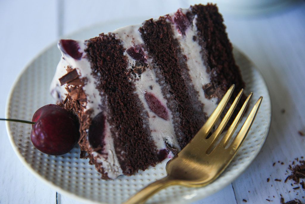 Black Forest Ice Cream Cake can be topped with cherries and shaved chocolate.