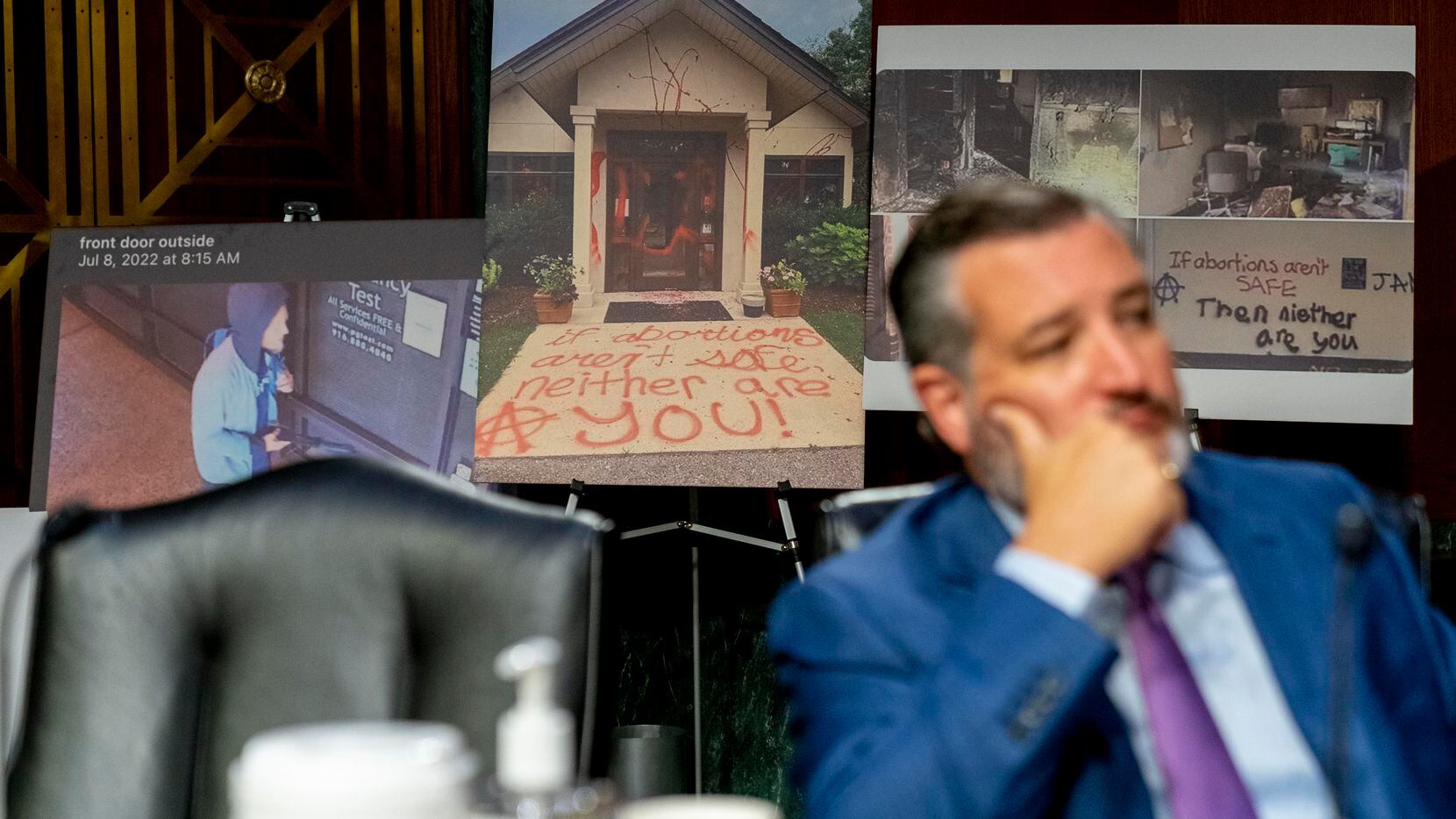 Sen. Ted Cruz, R-Texas, appears in front of images of vandalized anti-abortion pregnancy...