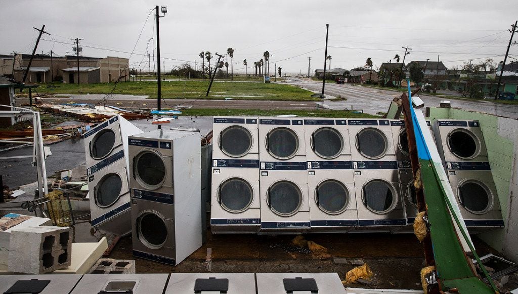 A laundromat's machines sit exposed in the elements after Hurricane Harvey ripped through Rockport, Texas, on Saturday, Aug. 26, 2017.  The fiercest hurricane to hit the U.S. in more than a decade spun across hundreds of miles of coastline where communities had prepared for life-threatening storm surges â walls of water rushing inland. 