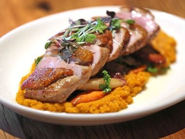 Grilled duck breast is one of the menu items at  Whiskey Cake in Irving, one of the restaurants that's transitioned to to-go/delivery service.