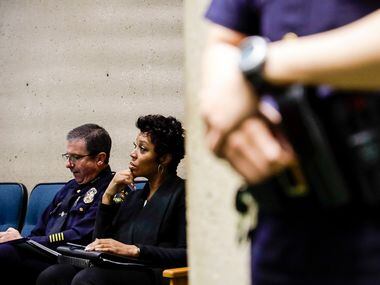 Dallas Police Chief U. Renee Hall (center) listens during a previous juvenile curfew public...