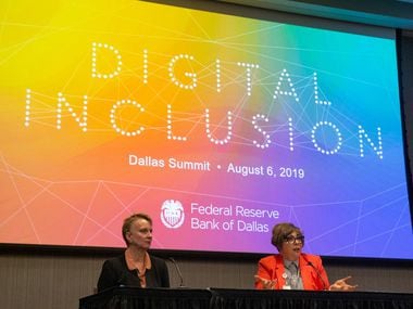 Jordana Barton (right), a senior adviser at the Federal Reserve Bank of Dallas, spoke with Susan Hoff, chief strategy officer for the United Way of Dallas, during a panel Tuesday at the Digital Inclusion Summit at the Federal Reserve Bank of Dallas building in Dallas.
