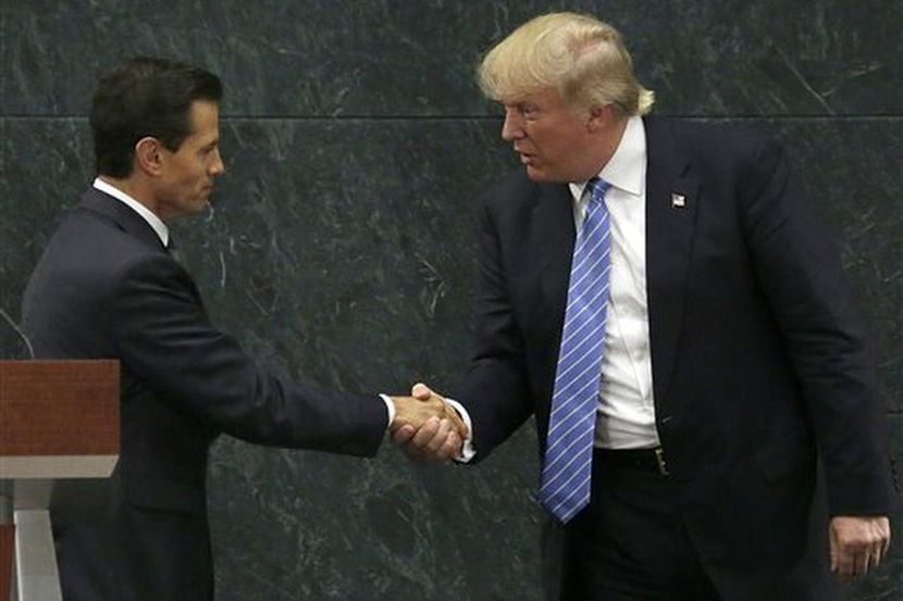 ARCHIVO – En esta imagen del 31 de agosto de 2016, el presidente de México, Enrique Peña...