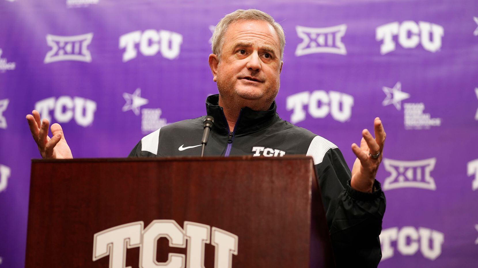 TCU head football coach Sonny Dykes gestures as he speaks to reporters in Fort Worth, Texas,...