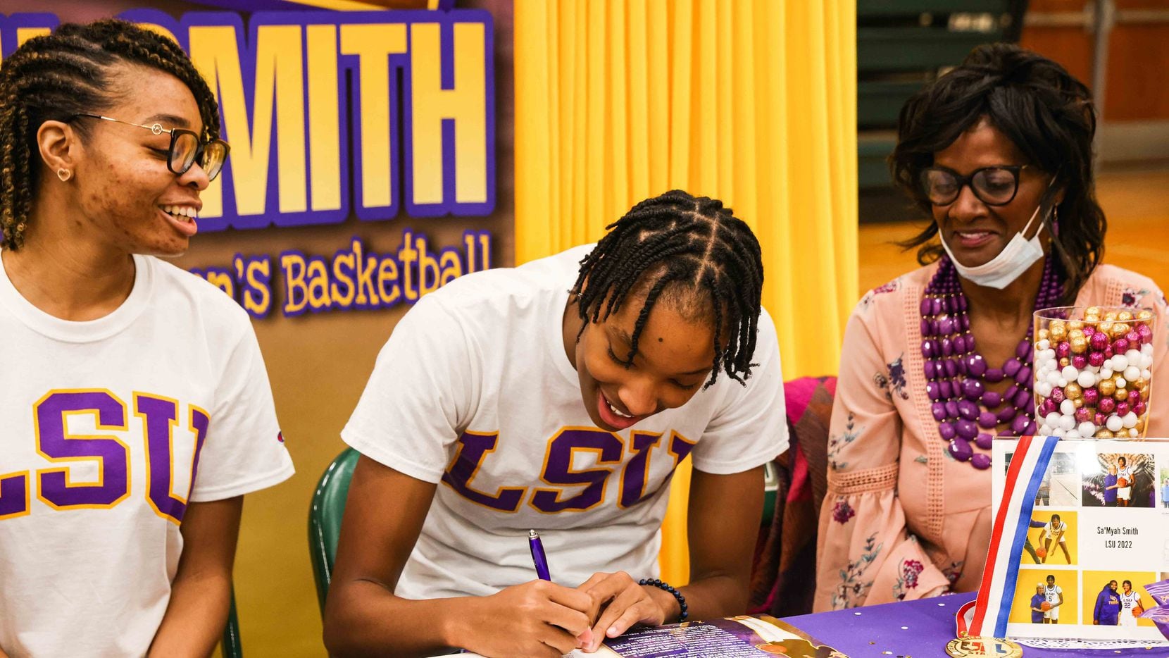 DeSoto basketball player Sa'Myah Smith, the No. 1 recruit in the area, signs her national...