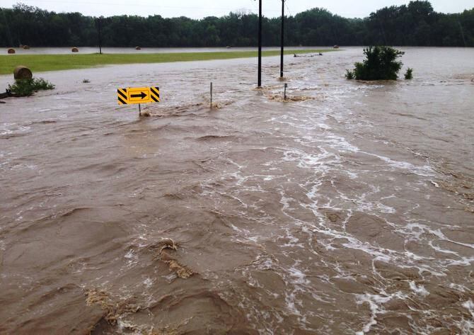 
A road off Interstate 35 in Sanger was temporarily a river on Thursday after the town...