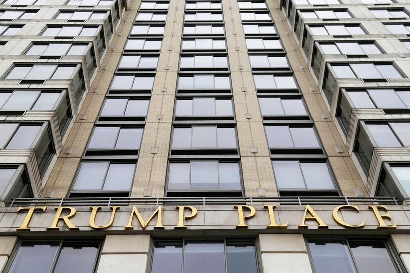 En esta imagen del jueves 11 de enero de 2018 se observan las letras doradas “Trump Place”...