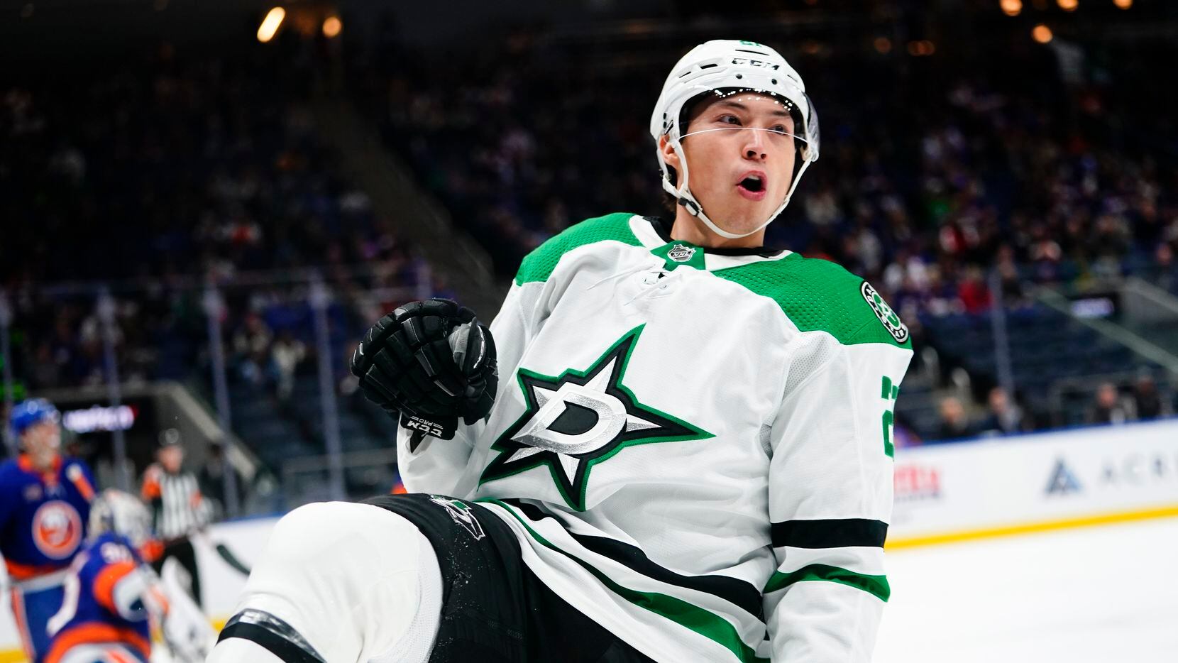 Dallas Stars' Jason Robertson celebrates after scoring a goal during the first period of an...