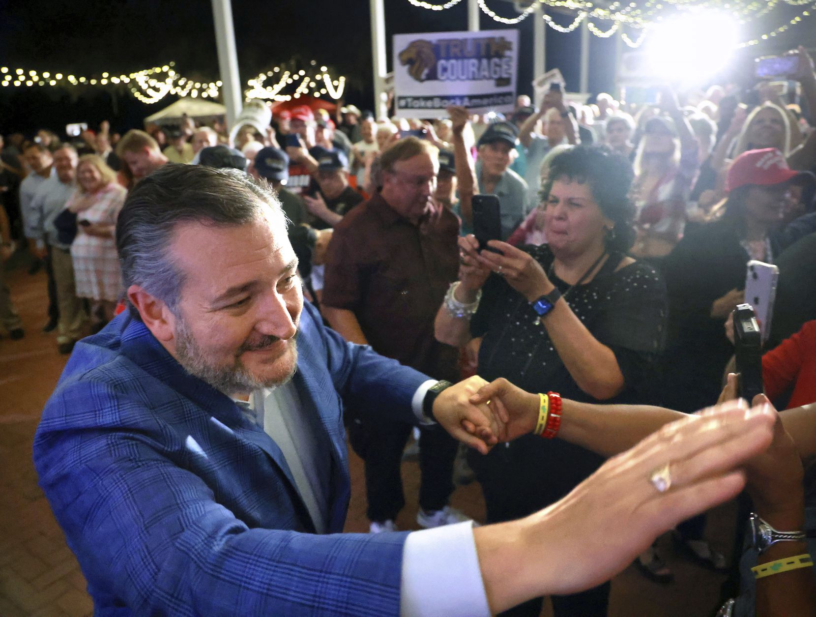 Sen. Ted Cruz greets supporters at a rally for Republican congressional candidates Cory...