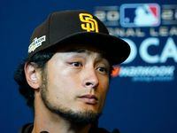 San Diego Padres starting pitcher Yu Darvish, of Japan, speaks during a news conference the...