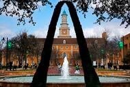 The University of North Texas  Administration Building is seen through a piece of artwork...