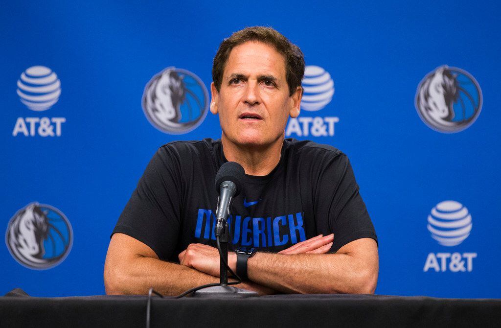 FILE - Mavericks owner Mark Cuban speaks to reporters after the Mavericks beat the Nuggets...