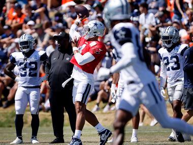 Dallas Cowboys quarterback Dak Prescott (4) throws a pass before facing the Denver Broncos...